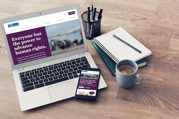 the advocates for human rights homepage mockup on laptop and mobile